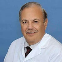 Photo of Dennis Slamon, MD, PhD, FAACR