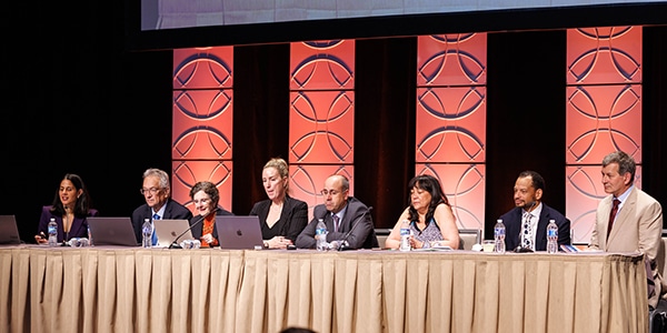Photo of a panel discussion at the San Antonio Breast Cancer Symposium December 2023.