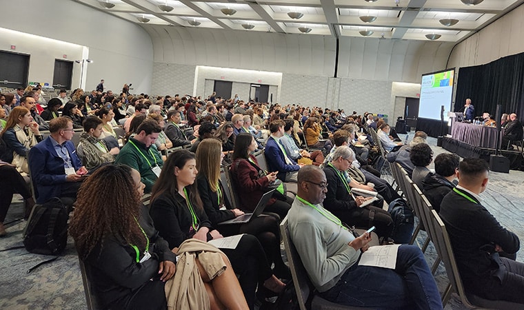 A room filled with seated audience members at “Strategies to Effectively Communicate Science to the Public” special session during the AACR Annual Meeting 2024.