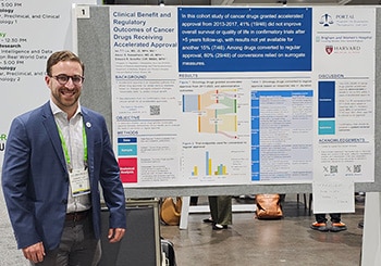 Edward Cliff, MBBS, MPH, presenting his poster on the Accelerated Approval of cancer drugs at the AACR Annual Meeting 2024.