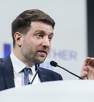 Jakob Nikolas Kather, MD, speaking on stage at the AACR Annual Meeting 2024.