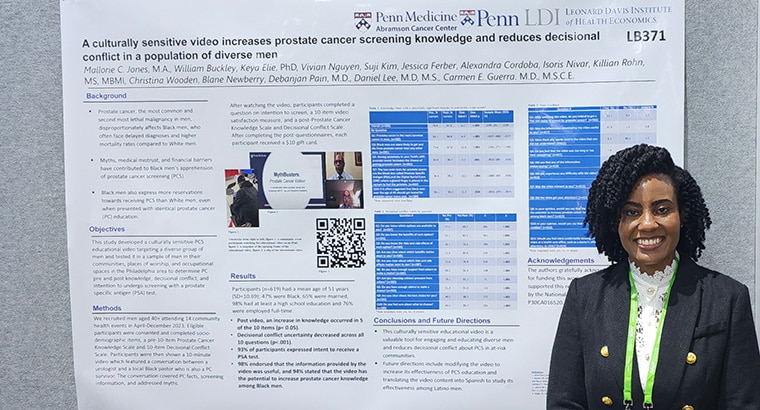 Mallorie C. Jones, MA, standing in front of her poster detailing the use of a video to increase awareness about prostate cancer at the AACR Annual Meeting 2024.