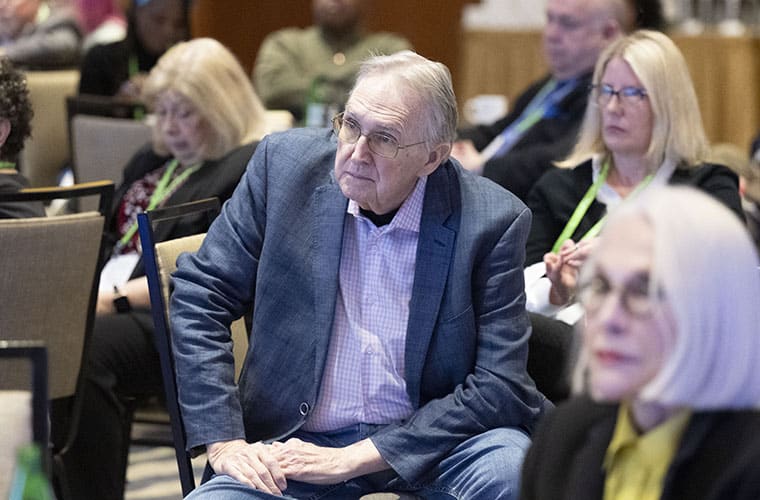 Bill Winkler, a patient advocate, sitting during an SSP session at the AACR Annual Meeting 2024.